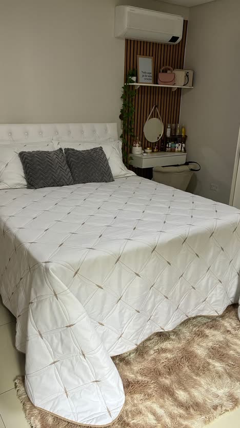 First frame of the analysed post: a neatly made white bed in a bright, tidy bedroom.